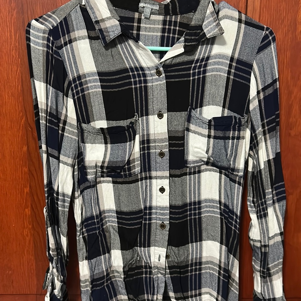 Blue, black, and white plaid shirt